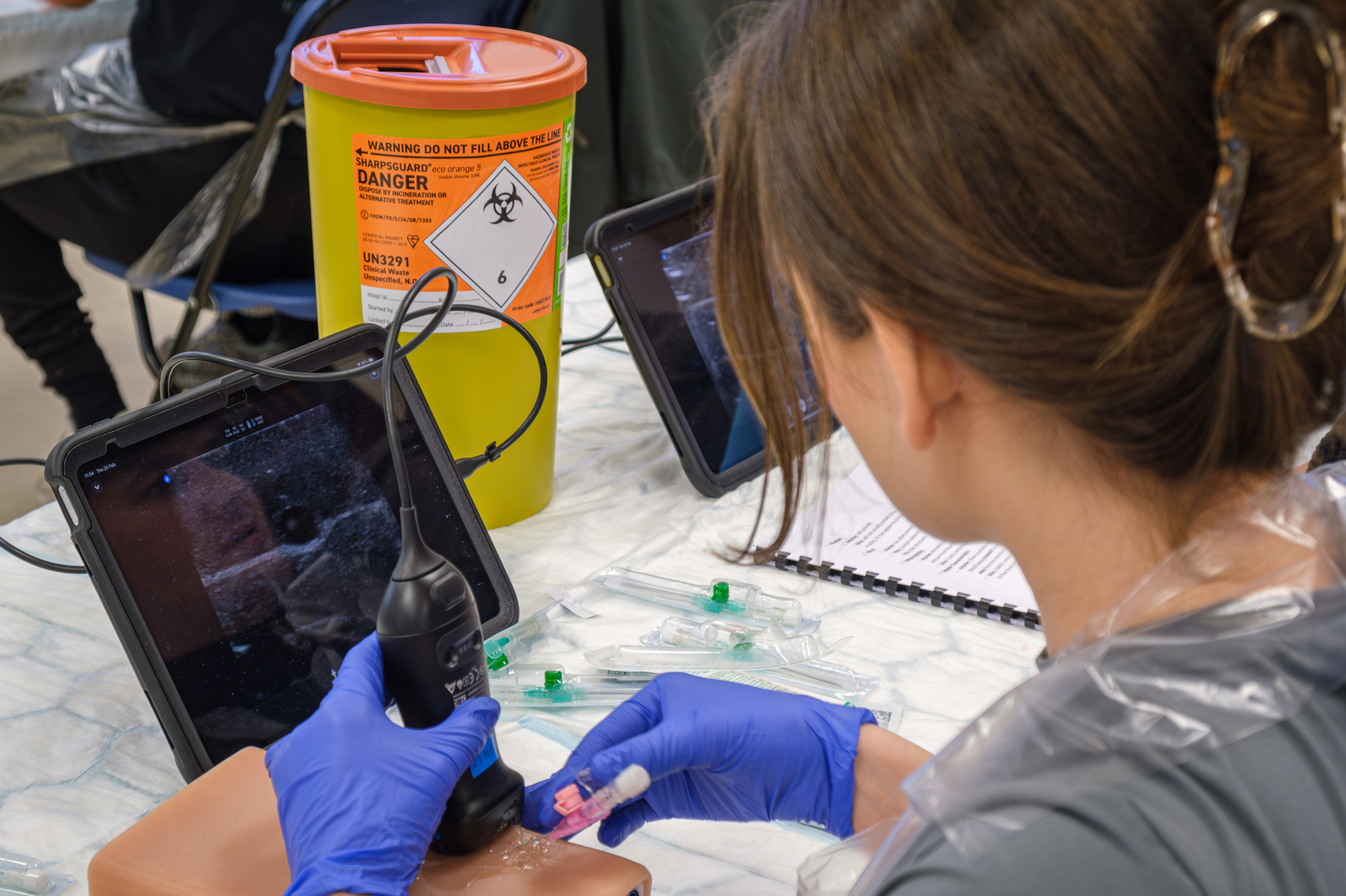 Butterfly iQ3 probe connected to an iPad during a university simulation exercise